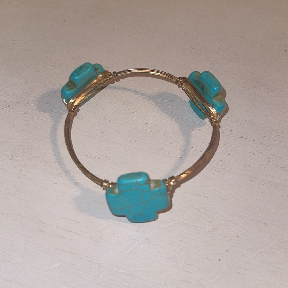Beautiful gold wire bracelet with 3 turquoise stone cross stones